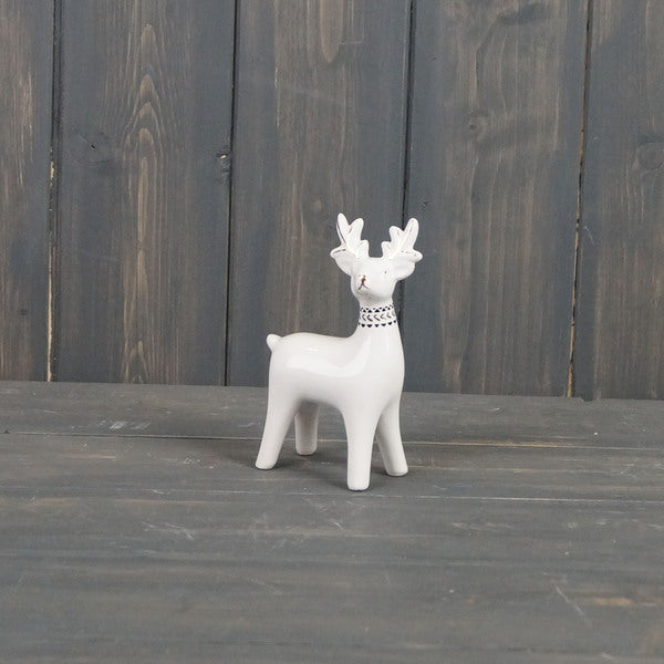 Ceramic standing reindeer deco size 7.8*3.8*12cm