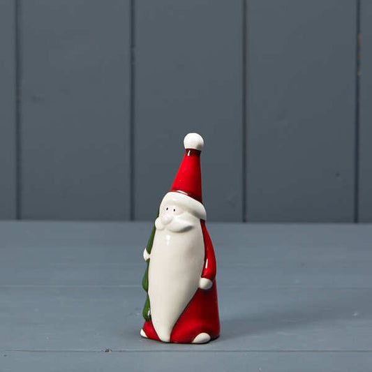 Ceramic Santa holding tree 5x4.5x12cm